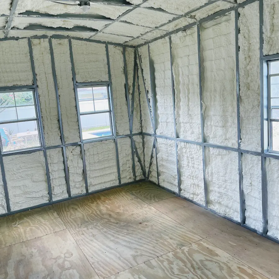 Closed-cell spray foam insulation applied to wall cavities in a residential project in Lady Lake